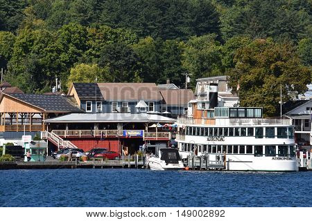 LAKE GEORGE, NY - SEP 24: View of Lake George from the Village, in New York State, as seen on Sep 24, 2016. The lake lies within the upper region of the Great Appalachian Valley and drains all the way northward into Lake Champlain and the St. Lawrence Riv