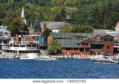 LAKE GEORGE, NY - SEP 24: Cruises around Lake George in New York State, as seen on Sep 24, 2016. The lake lies within the upper region of the Great Appalachian Valley and drains all the way northward into Lake Champlain and the St. Lawrence River drainage