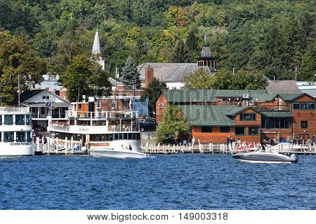 LAKE GEORGE, NY - SEP 24: Cruises around Lake George in New York State, as seen on Sep 24, 2016. The lake lies within the upper region of the Great Appalachian Valley and drains all the way northward into Lake Champlain and the St. Lawrence River drainage