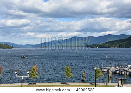 LAKE GEORGE, NY - SEP 24: View of Lake George from the Village, in New York State, as seen on Sep 24, 2016. The lake lies within the upper region of the Great Appalachian Valley and drains all the way northward into Lake Champlain and the St. Lawrence Riv