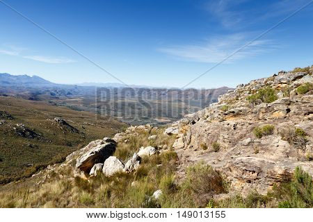 In The Middle Of The Swartberg Pass Looking Down At A Plateau