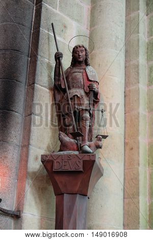 Mont Saint Michel France - September 8 2016 Benedictine Abbey of Mont Saint-Michel in Normandy Archangel Michael with scales and sword