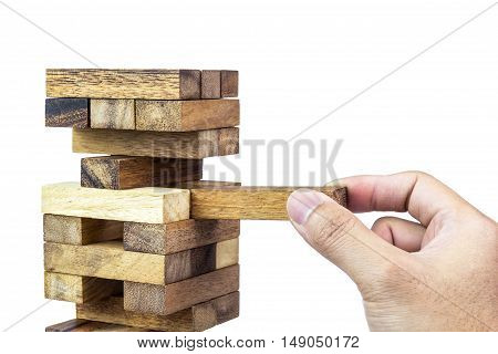 A photo of man playing jenga A risks in business concept Selective focus Soft focus