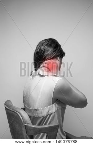 Young woman having pain in the neckPain in the neck