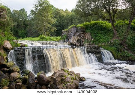 Waterfall in Belarus, popular place for recreation and bathing in the stream. Miori, river Viata.