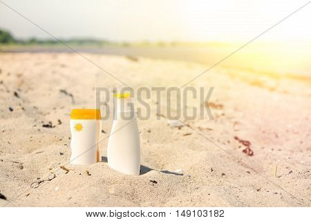 Sunlotion In The Sand On A Beach