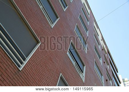 A generic Housefront with a brick wall.