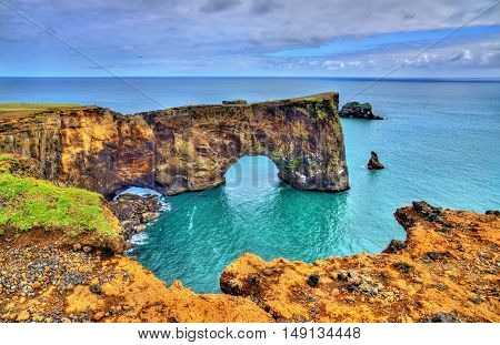 Natural arch of Dyrholaey Peninsula in South Iceland