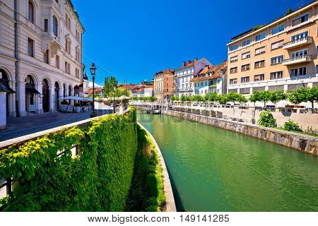 Green Ljubljanica riverfront in Ljubljana capital of Slovenia