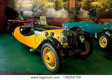 El Segundo, CA, USA - September 26, 2016: Bright yellow 1935 Morgan displayed at the Automobile Driving Museum in El Segundo, California, United States. Editorial use only.