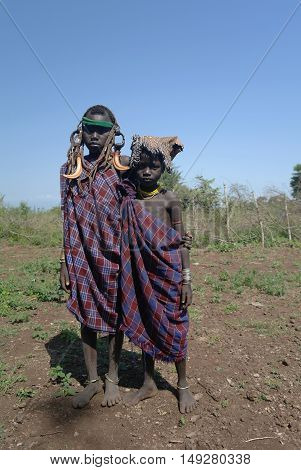 Mursi tribe girls - 05 october 2012, Omo valley, Ethiopia