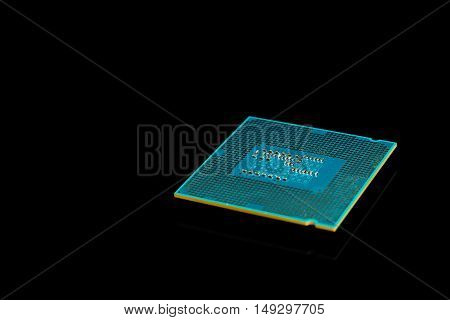Computer processor chip CPU on black reflective background