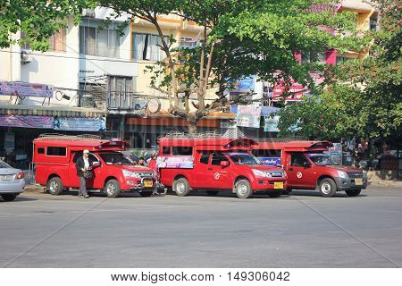 CHIANG MAI, THAILAND - FEBRUARY 28 2015: Red taxi Chiang Mai at Taxi to City Center. Photo at Chiangmai bus station, thailand.