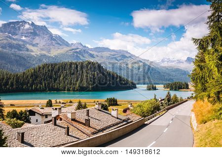 Great view of the azure pond Champfer in alpine valley. Popular tourist attraction. Picturesque and gorgeous scene. Location Swiss alps, Silvaplana village, district of Maloja, Europe. Beauty world.