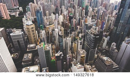 Aerial photo from flying drone of a business district in China with many tall skyscrapers. Top view exterior of office buildings with modern design in developed metropolitan city. Website background
