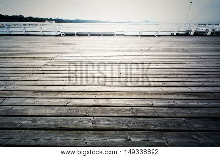 Wooden pier in Sopot Poland. Jetty on the water. Baltyk sea.