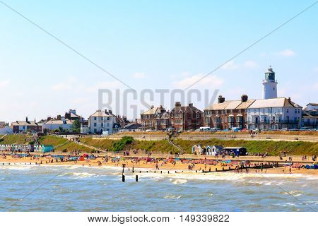 Seaside Cottages And Lighthouse At Southwold Beach