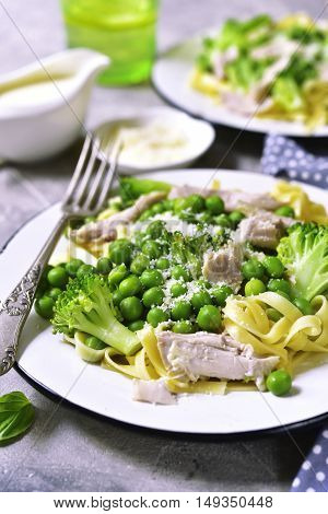 Pasta With Green Vegetables And Chicken With Cream Sauce Bechamel.