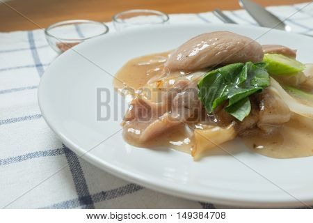 Rad Na, Famous Thai Chinese Style Wide Rice Noodle Dish With Tasty Tender Pork With Thick Gravy Sauc