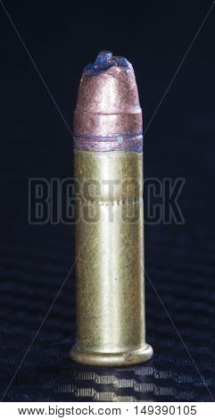 Big hunk out of the lead bullet on a rimfire cartridge