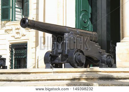 Cannon before Auberge de Castille in capital of Malta - Valletta Europe.