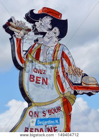 GRANBY QUEBEC CANADA 09 28 2016: Sign of Cantine Ben La Bedaine fast food restaurant some of the best Quebecois comfort food available.