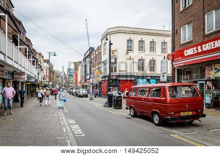 LONDON UK - AUGUST 23 2015: Brick Lane is a street in east London It is famous for its many curry houses and for being a vibrant art and fashion area