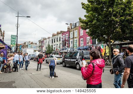 LONDON UK - AUGUST 20 2015: Camden Town Market famous alternative culture shops. Mainly tourist oriented selling souvenirs crafts and fashion products