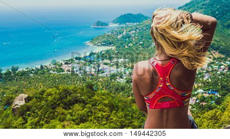 Young Beuatiful Girl is Sitting on Koh Tao Island View to Sairee Beach and Nang Yuan Island
