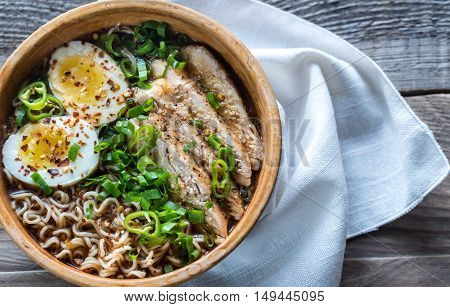 Bowl Of Chicken Ramen Soup On The Wooden Table