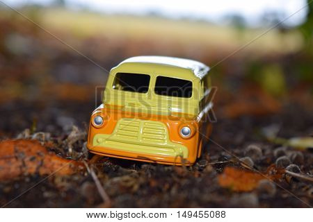 vintage toy car camper van outdoors nature background