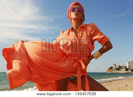 Gorgeous Sexy Woman In Luxurious Outfit, Posing On Summer Beach