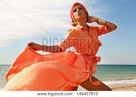 Gorgeous Sexy Woman In Luxurious Outfit, Posing On Summer Beach