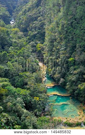 Beautiful turquoise pools and limestone bridges surrounded by the jungle in Semuc Champey in Alta Verapaz region Guatemala
