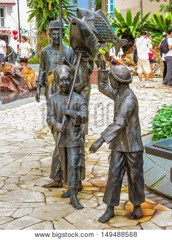 SINGAPORE, REPUBLIC OF SINGAPORE - JANUARY 09, 2014: Sculptures of Chinese processions in the Telok Ayer area, Singapore