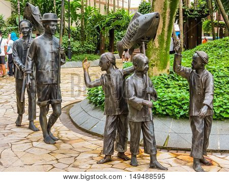 SINGAPORE, REPUBLIC OF SINGAPORE - JANUARY 09, 2014: Sculptures of Chinese processions in the Telok Ayer area, Singapore