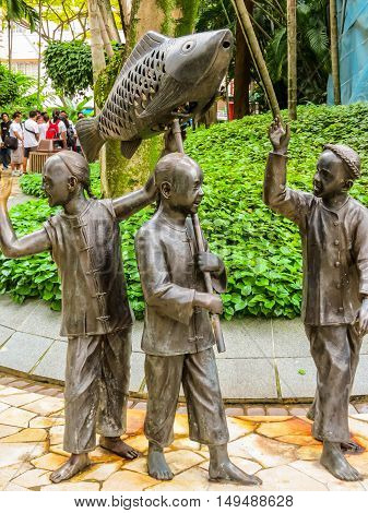 SINGAPORE, REPUBLIC OF SINGAPORE - JANUARY 09, 2014: Sculptures of Chinese processions in the Telok Ayer area, Singapore