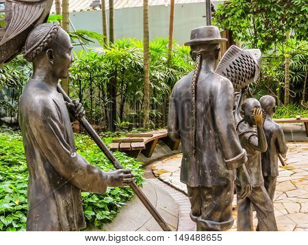 SINGAPORE, REPUBLIC OF SINGAPORE - JANUARY 09, 2014: Sculptures of Chinese processions in the Telok Ayer area, Singapore