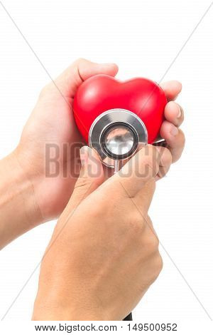 Red heart and a stethoscope on white background