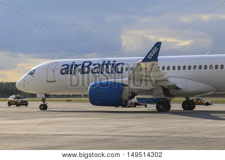 RIGA - SEPTEMBER 27: airBaltic new Bombardier CSeries passenger jet on display at Riga Airport - September 27, 2016 in Riga, Latvia