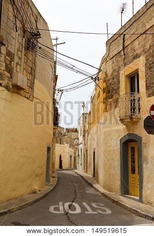Traditional narrow street in Gozo. Maltese architecture in Rabat, Malta