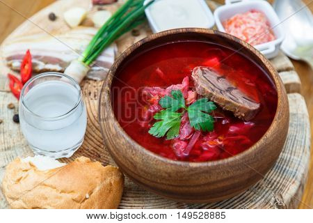 Traditional Ukrainian Russian Vegetable Soup, Borsch With Garlic Donuts, Pampushki On A White Wooden