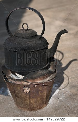 Blackened Kettle On A Fire Pot