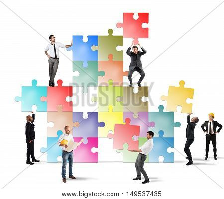Concept of Teamwork with team of businesspeople that builds a new company