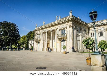 WARSAW POLAND - SEPTEMBER 27: Southern facade of the Lazienki Palace the Palace on the Water or the Palace on the Isle in Royal Baths Park Lazienki Park in Warsaw Poland on September 27 2016