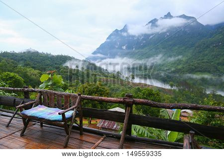 Mountain in nature and forest, Feeling good in relax day or holiday in the mountain,Forested mountain slope in low lying cloud with the evergreen conifers shrouded in mist in a scenic landscape view.