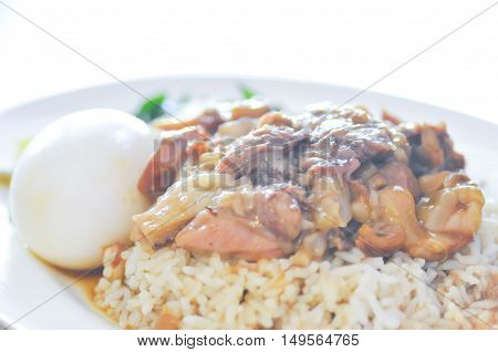 pork stewed with boiled egg on rice dish
