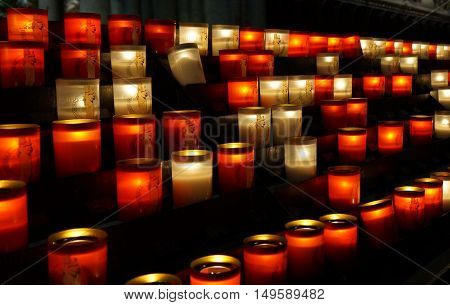 White and red candles at catholic church