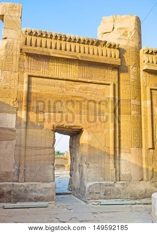 The scenic entrance with preserved reliefs leads to Ineer Hypostyle hall in Egyptian Temple of Kom Ombo.