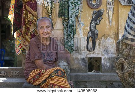 Tenganagan Bali Indonesia September 10th 2016: old lady at her doorstep